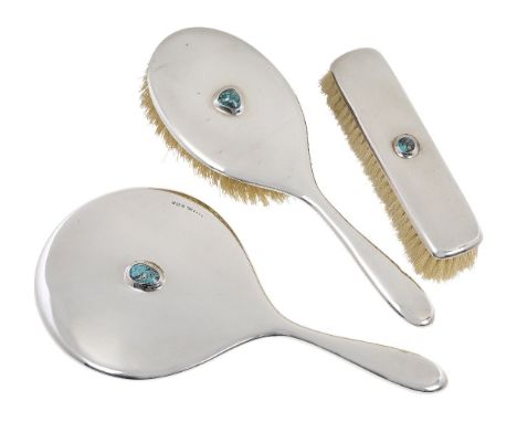 Liberty & Co (British), a silver dressing table set with turquoise matrix cabochons   Mark of Liberty & Co, Birmingham hallma