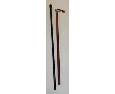 A malacca shafted walking cane, made from timber and copper from HMS Foudroyant, 92cm together with a horn handled stick (2)
