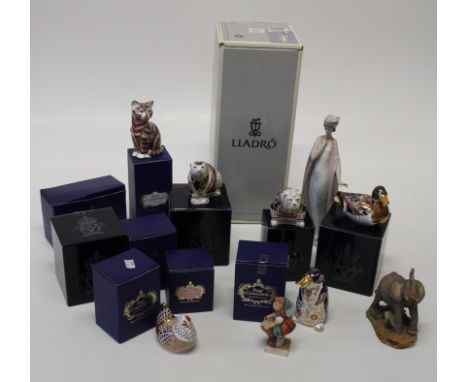 A collection of ten Royal Crown Derby paperweights, including Imari Polar Bear, Brown Pelican, Platypus etc. Various stoppers