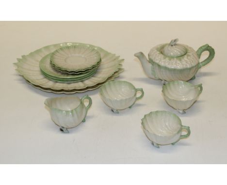 A Belleck porcelain tea service, second period black backstamp. Comprising terapot, cream, three cups, saucers and tea plates