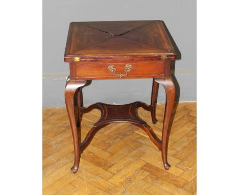 An Edwardian mahogany, satinwood banded envelope card table, with baize lined interior and frieze drawer, raised on cabriole 