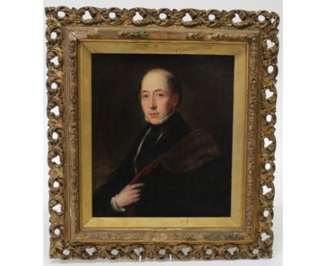 Early 19th century British School A half length portrait of a gentleman wearing a fur lined coat. Oil on board, framed, 35 x 