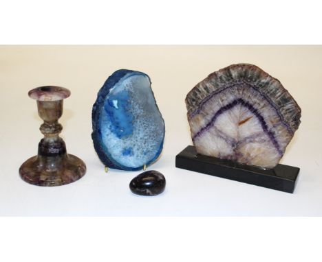 Derbyshire interest :- early to mid 20th Century blue john candle stick, large slice on stand, egg, and slice of aquamarine.