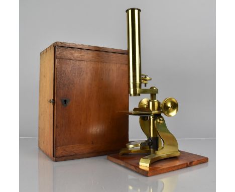 A 19th Century Cased Brass Microscope, Fitted Box with Tools, Lens and Base Drawer Containing Prepared Slides 