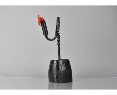 An Early Wrought Iron Rush Light Set on Wooden Block Base, 28cms High. Condition: Not perfect order with repair to candle hol