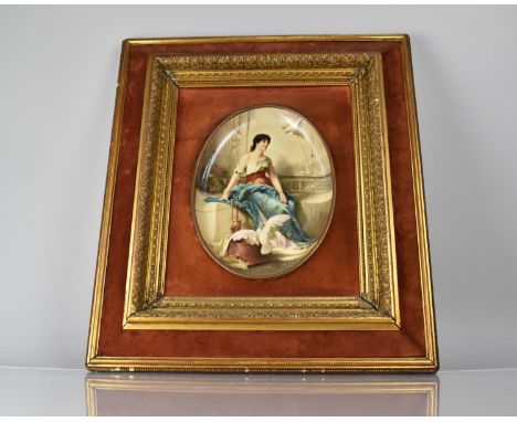 A Continental Cushion Framed Oval Enamel Plaque in the Vienna Style depicting Seated Maiden with Cockatoos, 31x24cms (Cracked