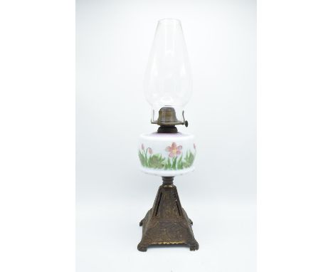 Victorian glass oil lamp with floral decoration. In good condition without any obvious damage or restoration. Height 52cm. Un