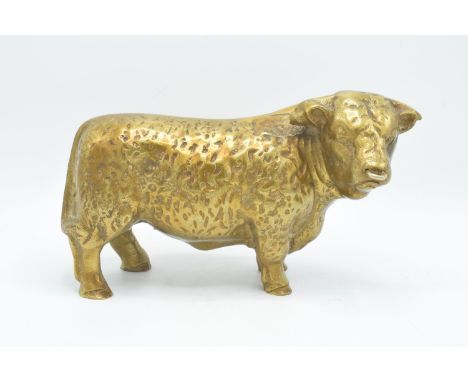 20th century cast brass butcher's shop model of a Hereford bull. Solid brass, approx 4kg heavy. 25 x 15cm. 