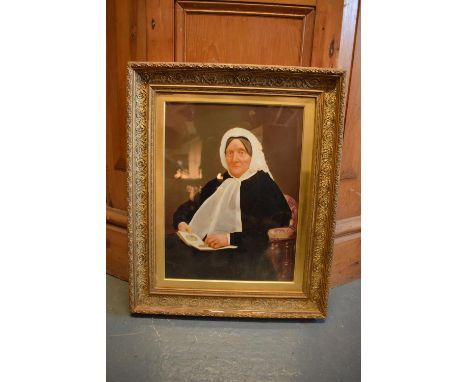 19th century oil on canvas of a lady admiring art whilst seated, in an ornate frame. The frame has experienced some knocks an