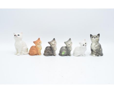 A collection of Beswick to include Kitten 1886 in grey and white and model 1436 x 4 to include 2 x grey, a matte ginger and a