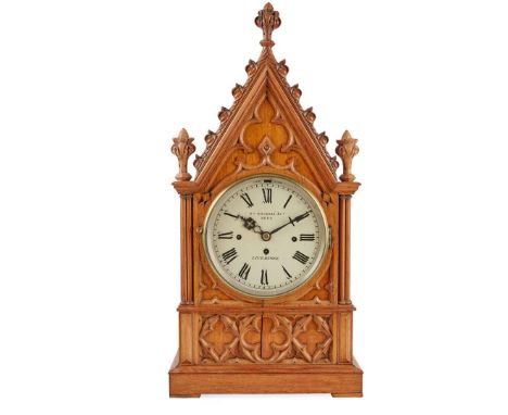 VICTORIAN GOTHIC REVIVAL CARVED OAK QUARTER CHIMING BRACKET CLOCK BY WILLIAM ROSKELL &amp; CO, LIVERPOOL, 19TH CENTURY the cr