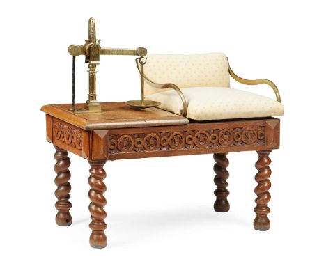  LATE 19TH CENTURY the upholstered seat with brass arms on a flower carved base mounted with a brass scale stamped twice ‘YOU