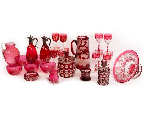 A collection of cranberry and ruby coloured glass, including jugs, bowls, ewers and drinking glasses CONDITION REPORT: Condit