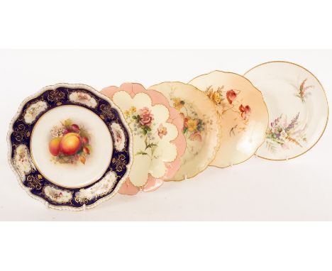 A Royal Worcester plate with central image of peaches and gooseberries, the cobalt blue border with floral vignettes and a gi