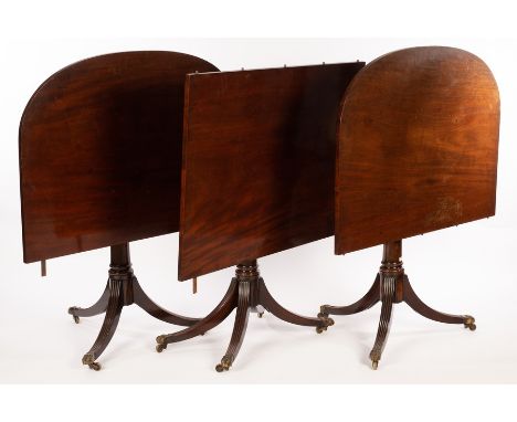 A mahogany two-pillar dining table, fitted an extra leaf, 230cm wide CONDITION REPORT: Condition information is not usually p