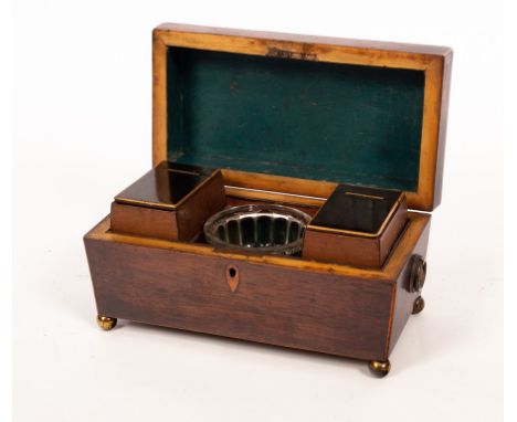A Regency mahogany sarcophagus-shaped tea caddy, 34cm wide CONDITION REPORT: Condition information is not usually provided in