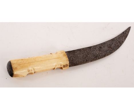 A Persian steel dagger with etched blade and bone handle, 30.5cm wide CONDITION REPORT: Lot contains an element of pre-1947 i