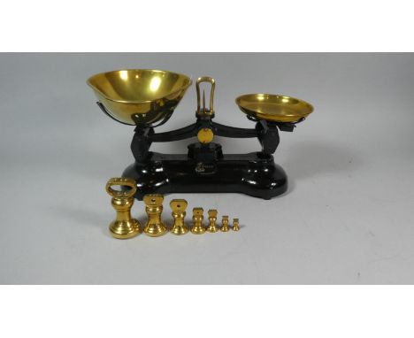 A Brass Mounted Kitchen Scale by Libra Complete with Five Graduated Brass Bell Weights 