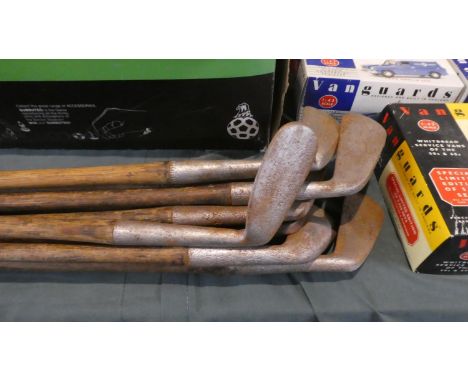 A Collection of Ten Vintage Wooden Shafted Golfing Irons 