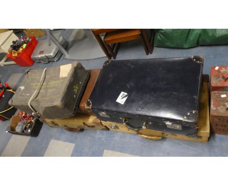 A Collection of Vintage Suitcases and Laundry Case 