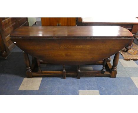 An Oak Drop Leaf Gate Leg Wake Table 