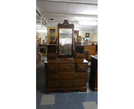 A Late Victorian/Edwardian Walnut Dressing Chest with Three Short Top Drawers, Raised Jewel Drawers and Swing Mirror, 106cm W