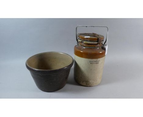 A Vintage Glazed Stoneware Anti Gas Ointment Bottle and a Glazed Planter 