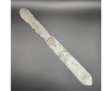 A Victorian silver and mother of pearl letter opener/page turner, Birmingham 1861Length of mother of pearl section: 13 cm app
