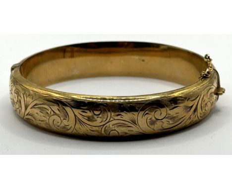 A 9ct gold bangle, 14.8 g