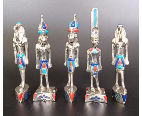 A set of five Egyptian style silver coloured metal and enamel figures, 6 cm126 g