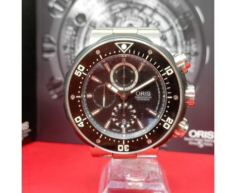 A gentleman's titanium Oris Chronograph Automatic wristwatch, 1000m, boxed with product manual and guaranteeOriginal box and 