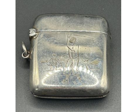 A George V silver vesta, engraved golfers, Chester 1913, 38.9 g, 4.5 cm high