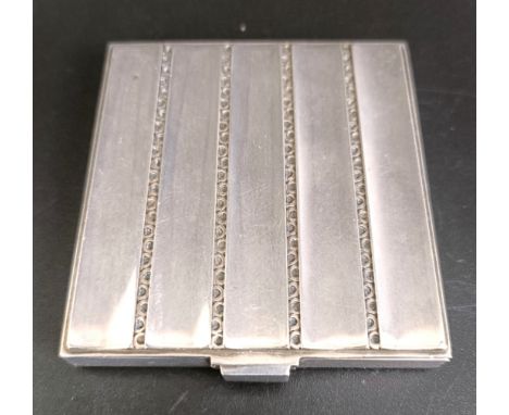 A Georg Jensen silver compact, fitted a mirror, 55 cm wide2.8 ozt (all in)marks rubbed, hinge slightly worn