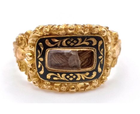 A George IV gold and black enamel memorial ring, engraved Elizth Yates, Ob 27 September 1825, At 42 Yr 7m, inset with a lock 