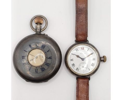 A silver faux memorial pocket watch, and a gentleman's silver Waltham wristwatch (2)