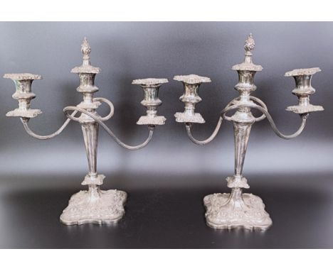 A pair of silver plated candelabra, 38 cm high (2)