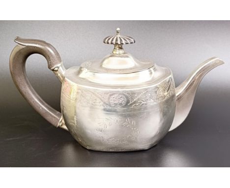 A silver bachelor's teapot, with an ebonised handle, marks rubbed, 9.0 ozt (all in), 10.5 cm highDents to both sides, and a l