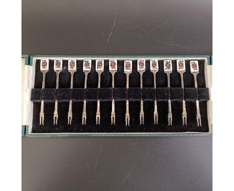 A set of twelve Elizabeth II silver sandwich picks, enamelled the Kings, Queens &amp; Jacks from the four playing card suits,