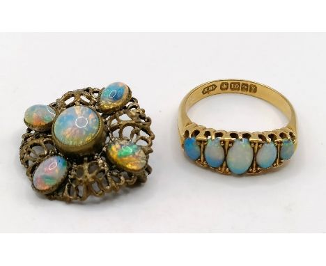 An 18ct gold and opal ring, ring size M, and an opal brooch (2) Provenance:  Sold on behalf of Dorset Wildlife Trustring:  va