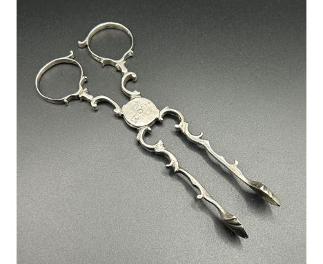 A pair of 18th century silver tongs, initialled, handles marked, 34.5 g