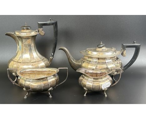 A George V four piece silver tea set, comprising a teapot, coffee pot, cream jug and sugar bowl, Birmingham 1934/35, 51.4 ozt