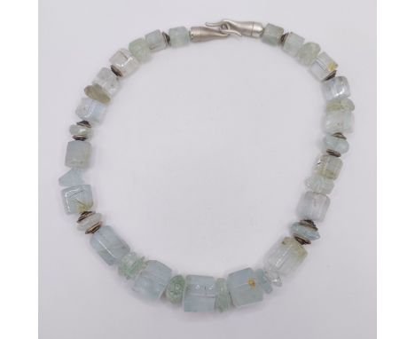 A 20th century aquamarine natural crystal form bead necklace, with silver coloured metal mounts