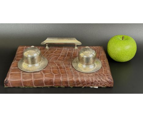 A George V faux crocodile skin, leather and silver inkstand, Birmingham 1925, 26 cm wide