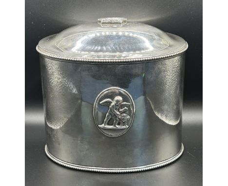 A George III silver tea caddy, of oval form, decorated classical scenes, crested and inscribed, London 1782, 14.2 ozt, 14.5 c