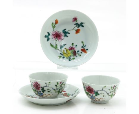 Depicting flowers, saucers are 12 cm. in diameter, hairline.