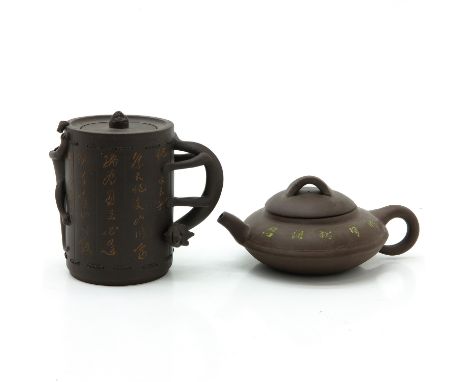 Both marked on bottom and inside lid, tallest is 12 cm., spout is missing on the tallest teapot.