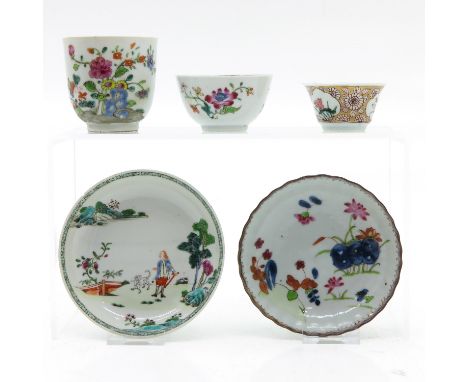 Depicting flowers, saucers are 12 cm. in diameter, chip and hairline.