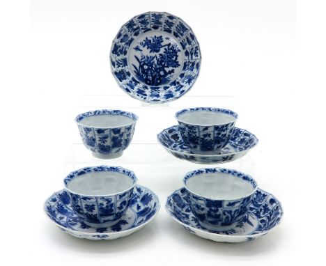 Scalloped edge saucers, depicting flowers, saucers are 14 cm. in diameter, marked with double ring and jade mark, chip.