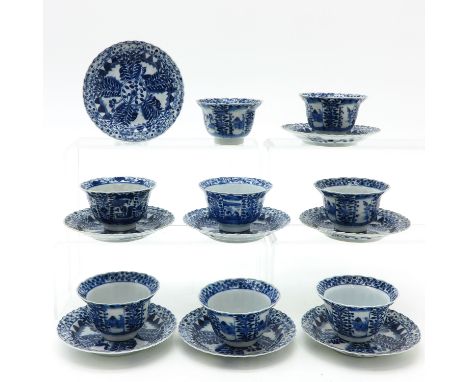 Depicting flowers with scalopped edge cups and saucers, marked on bottom with double ring and 4 characters, saucers are 13 cm