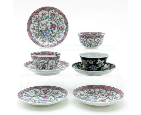 Including 3 cups and 5 saucers, depicting flowers and including Famille Rose enamels, saucers are 12 cm. in diameter.